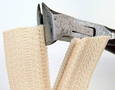 Cutting off plastic spiral using end cutting pliers