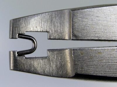 Large top stop correctly positioned in Osborne pliers