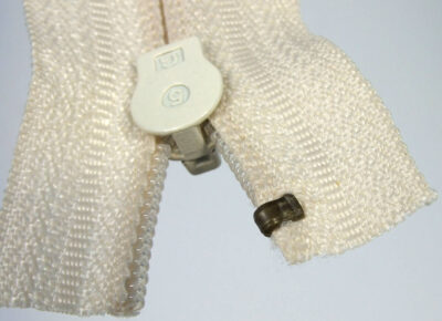 Pressing top stop using Osborne pliers – bottom side