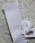 Delrin 9 slider slides over the Y-shaped top stop made by YKK