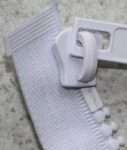 Delrin 9 slider slid beyond the Y-shaped top stop made by YKK